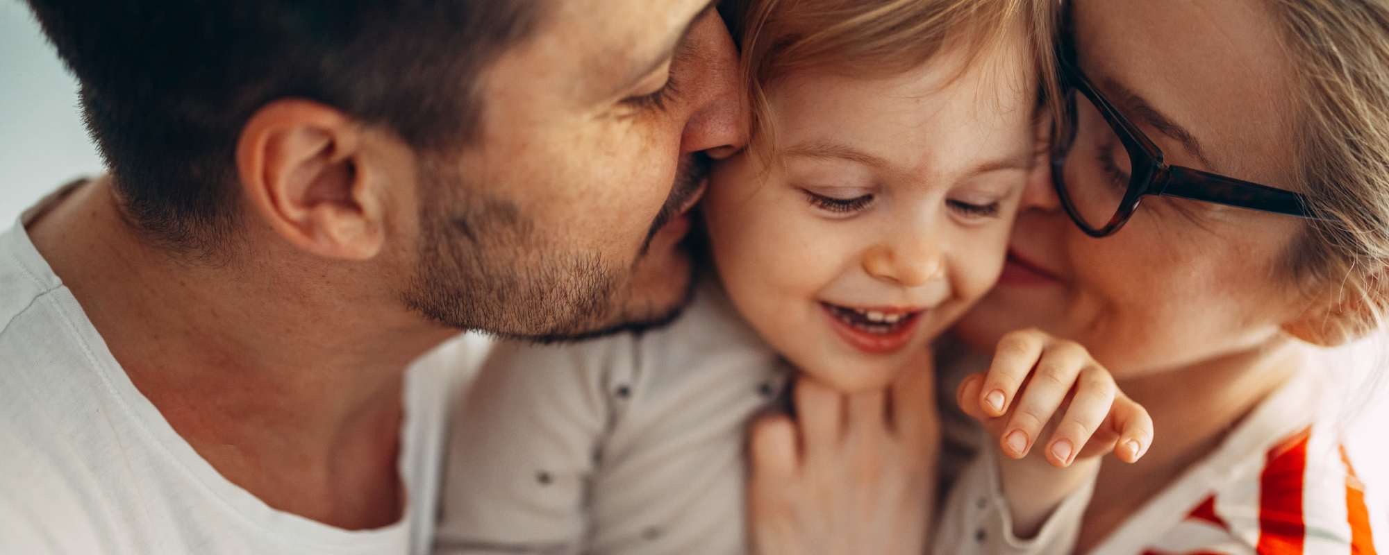 Happy family at ARTISAN Management Group in Des Moines, Iowa