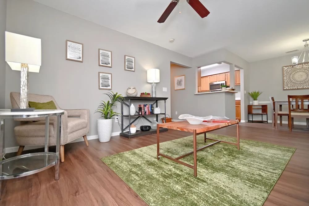 Well-furnished apartment living area at Woodspring Apartments in Florence, Kentucky