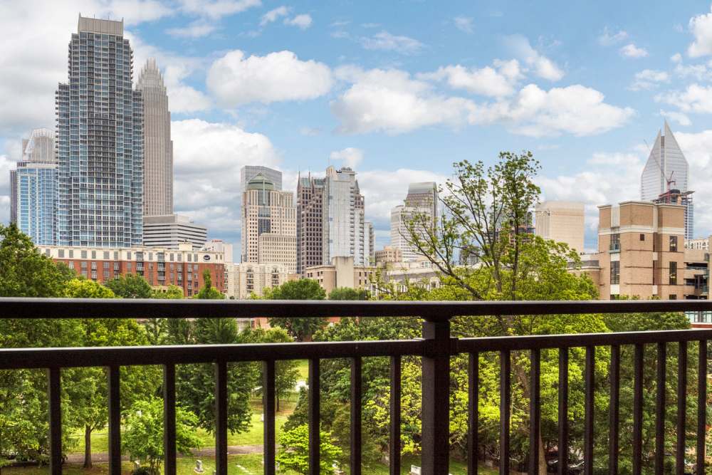 Balcony view overlooking the city at Cedar Flats in Charlotte, North Carolina