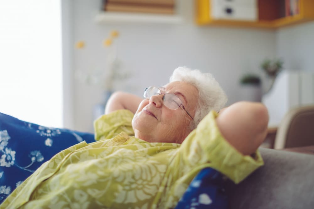 Resident relaxing at English Meadows Williamsburg Campus in Williamsburg, Virginia