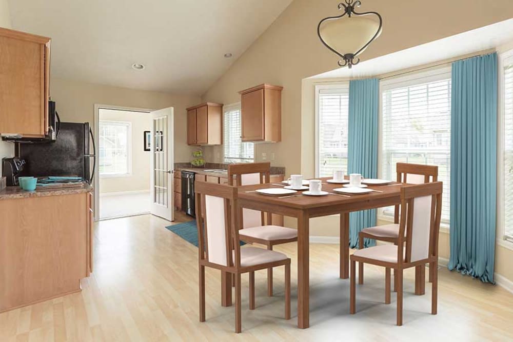 Dining room in a home at Hickory Hollow in Spencerport, New York