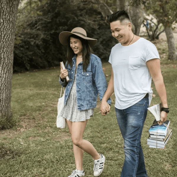 Resident couple walking in the park at Terraces of Elk Grove in Elk Grove Village, Illinois