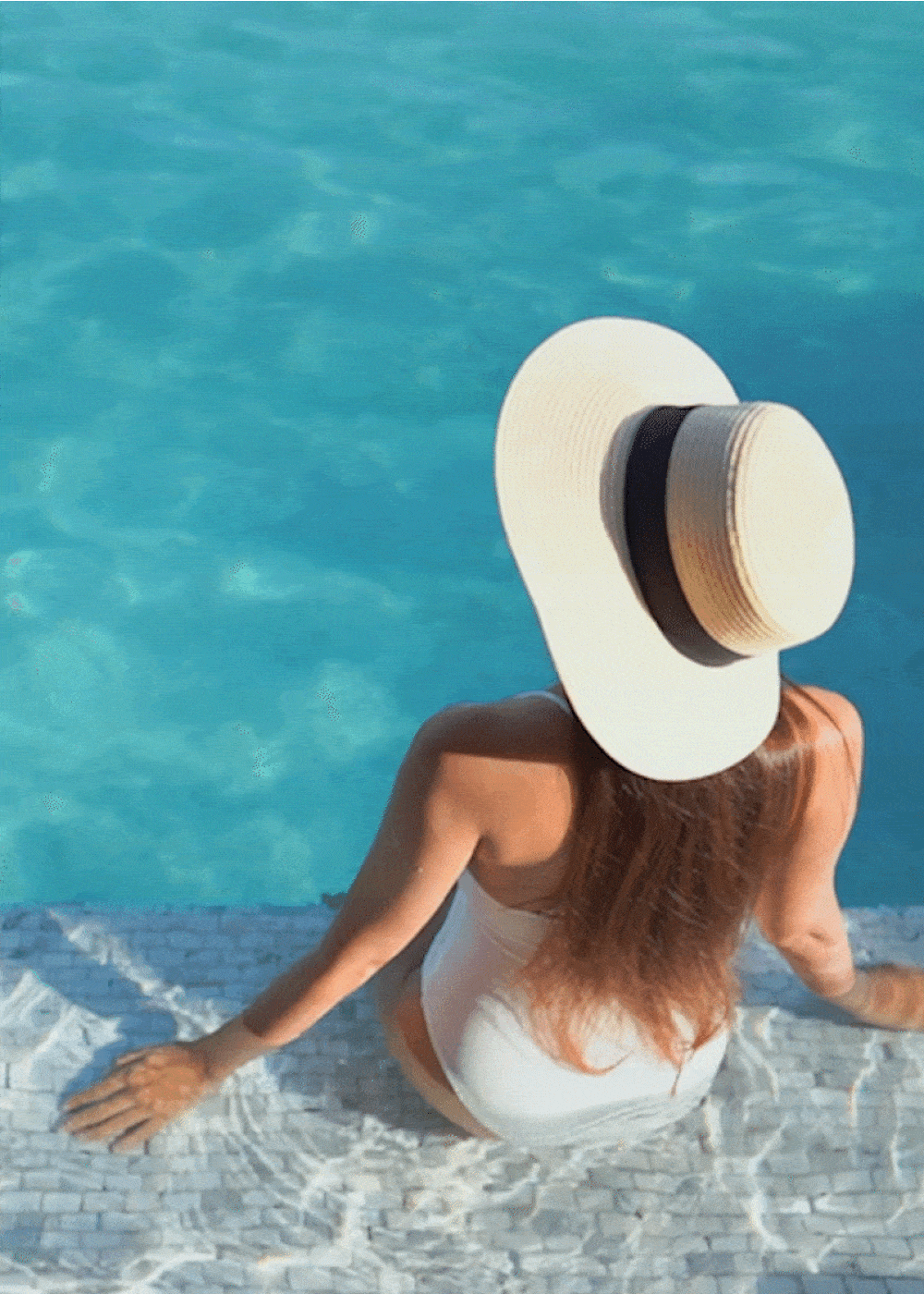 View amenities like our swimming pool at Strata Apartments in Denver, Colorado