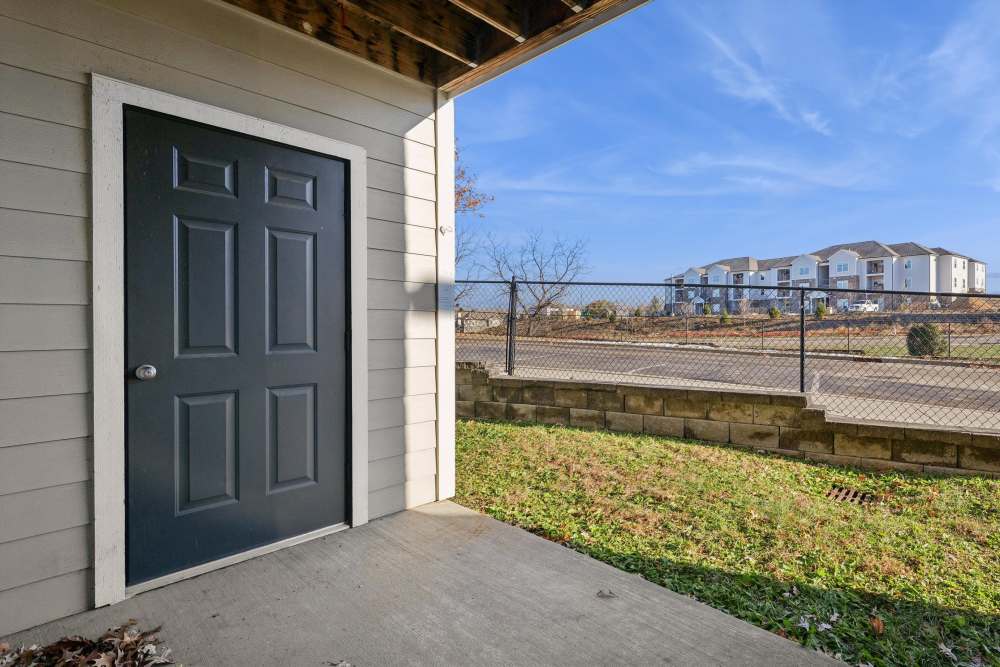 Charming entrance at a cozy property in Covington Woods Apartments in Lansing, Kansas.