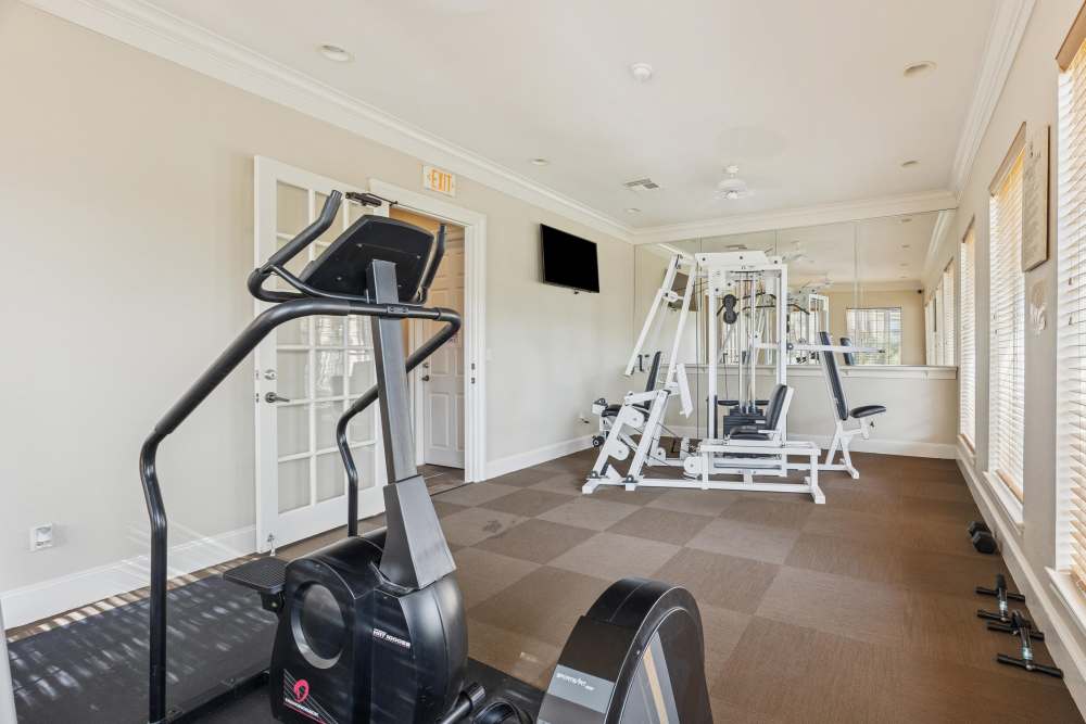 Well equipped fitness center at Brazoswood Apartments in Clute, Texas