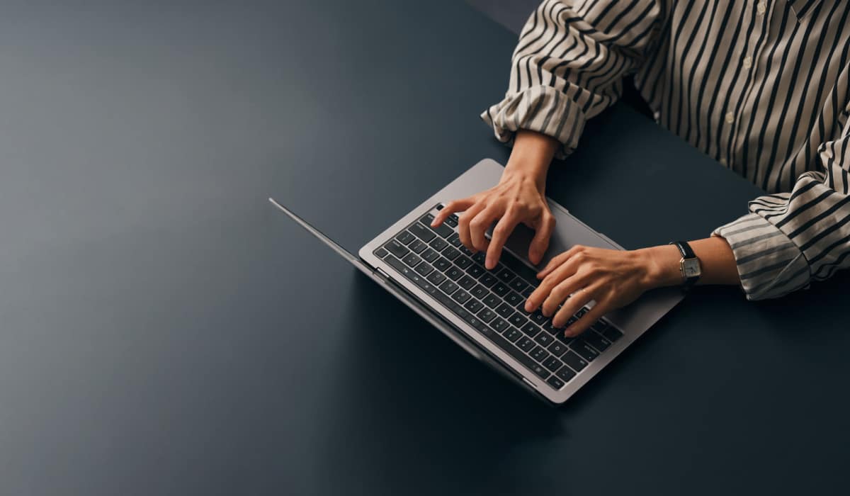 Employee working on their laptop at Vesta Bouldercrest in Atlanta, Georgia