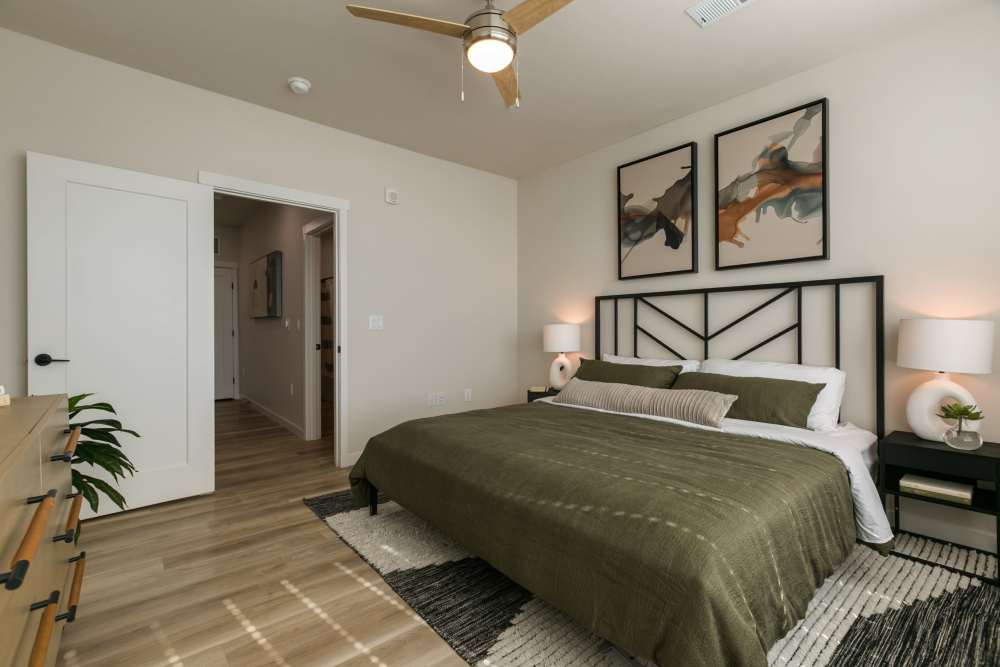 Bedroom with wooden flooring at Olympus Latitude in Albuquerque, New Mexico