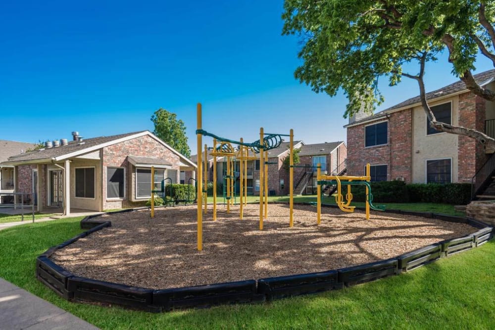 Children's playground at {location_name}} in Carrollton, Texas