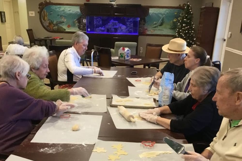 Residents making cookies at Inspired Living Hidden Lakes in Bradenton, Florida.