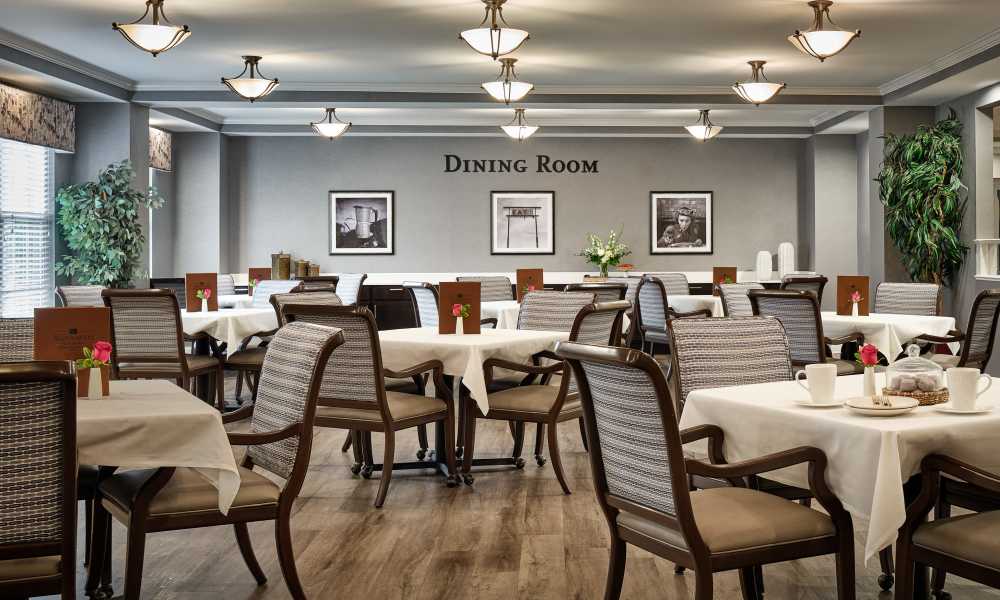 Elegant resident dining room at Waltonwood Cotswold in Charlotte, North Carolina  