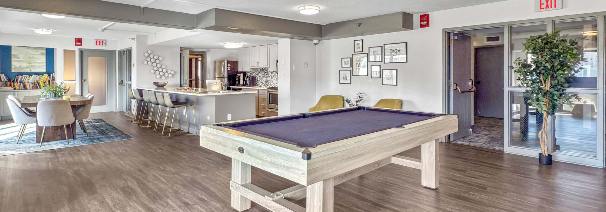 Clubhouse with several lounge spaces at The Parker at Seventh in Des Moines, Iowa