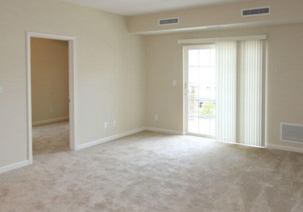 Stylish living room at Legends at North Ponds in Webster, New York