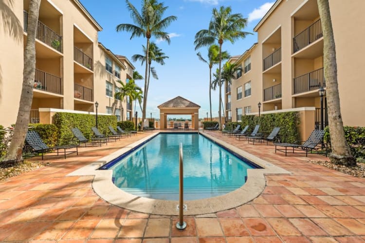 Luxurious pool and gazebo at St. Tropez Apartments in Miami Lakes, Florida