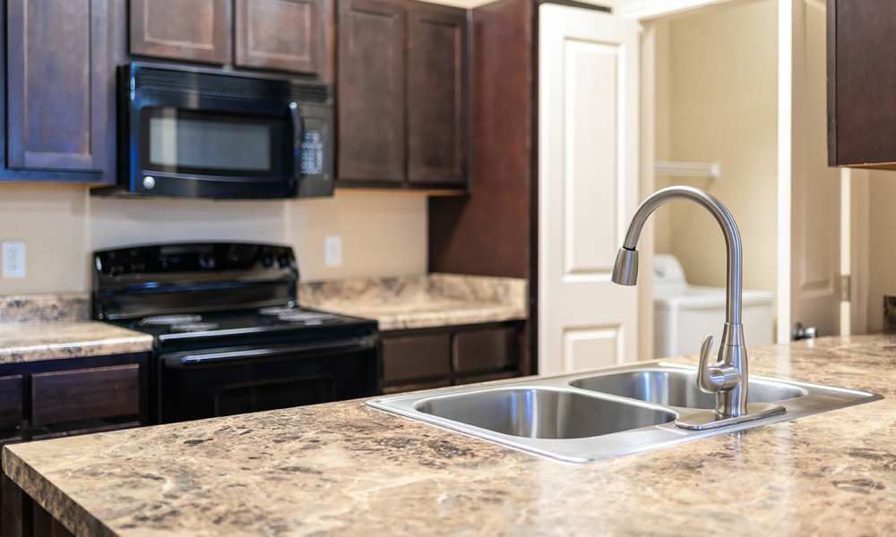 An apartment kitchen at Sunset Lodge in Odessa,Texas