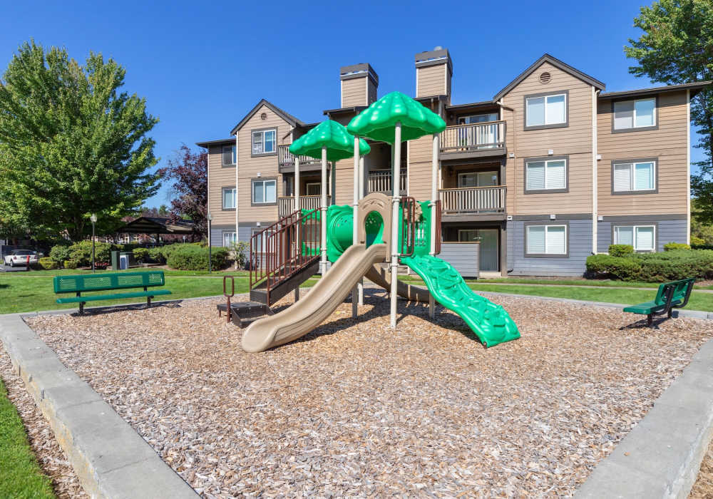 Community playground with slides and climbing area at Foundry on Fifth in Renton, Washington