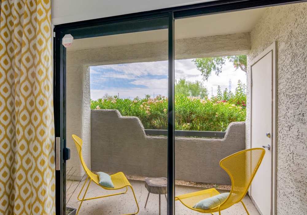 Sliding glass door to patio space at Cabrillo Apartments in Scottsdale, Arizona