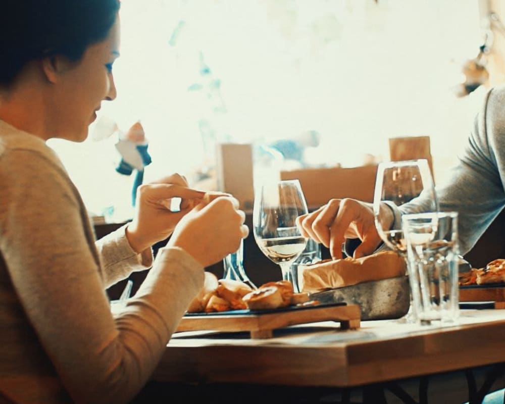 Residents enjoying a burger and fries near Avery at Moorpark in Moorpark, California