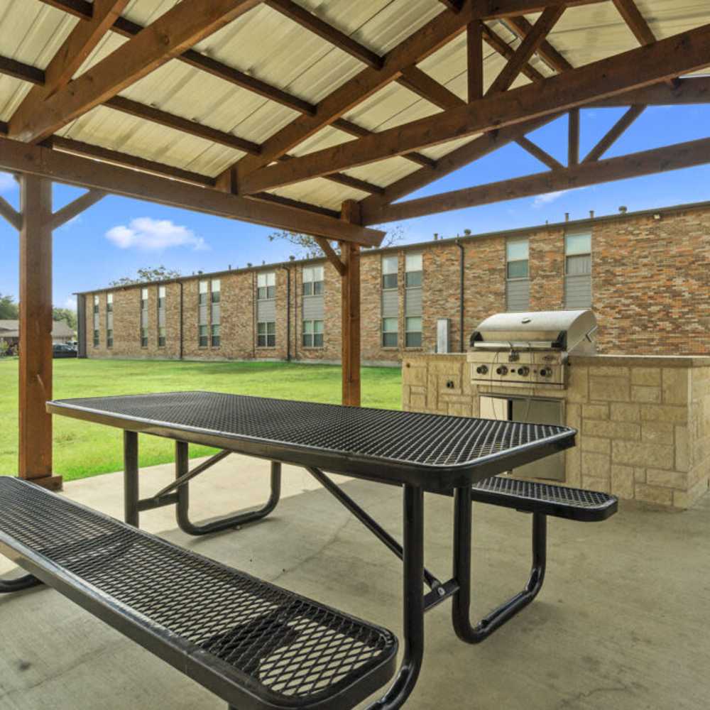 Outdoor grilling area at Cleburne Plaza in Cleburne, Texas