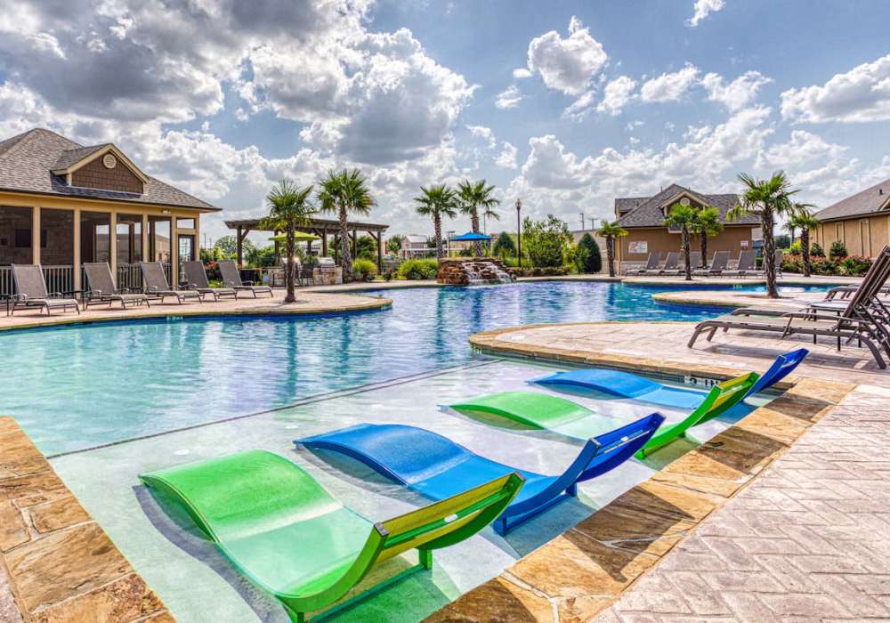 Luxurious pool deck at Arrington Ridge in Round Rock, Texas