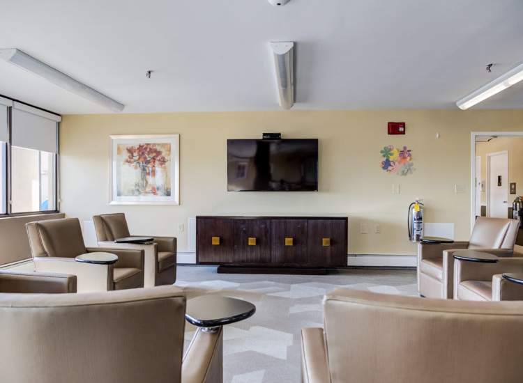 Community lounge area at Melville Towers in New Bedford, Massachusetts