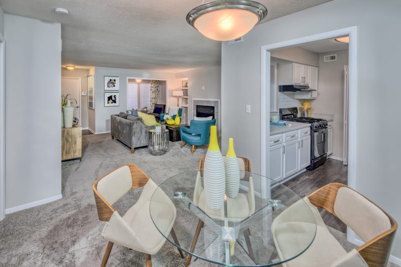 Living room and breakfast nook with modern decor at The Madison in Charlotte, North Carolina