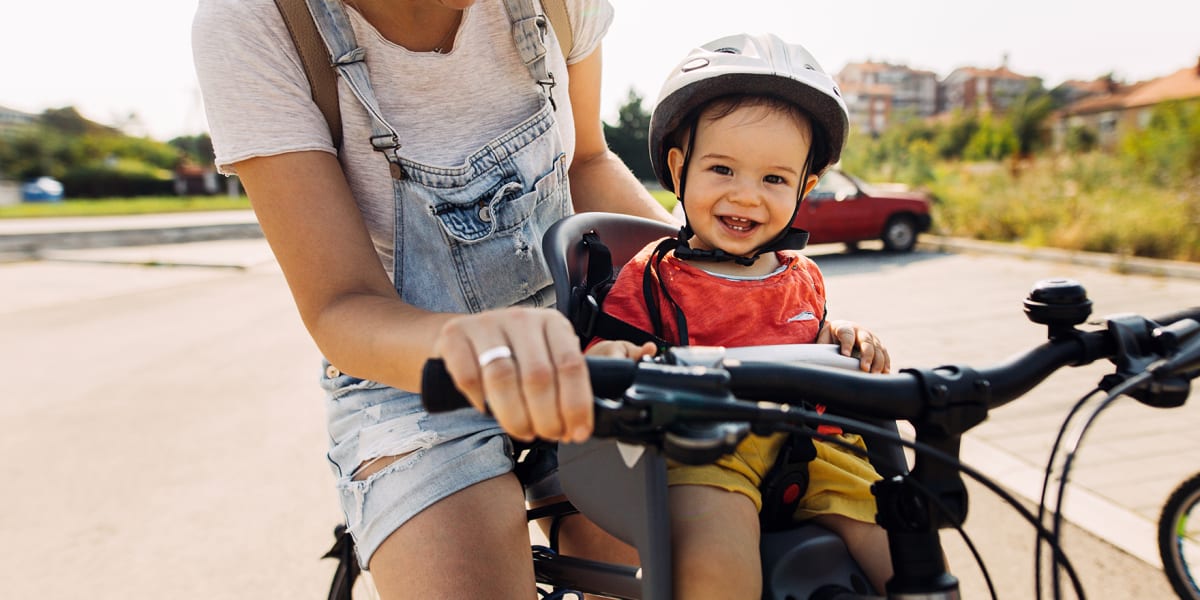 Woman taking her child on a bike ride near BB Living Light Farms in Celina, Texas