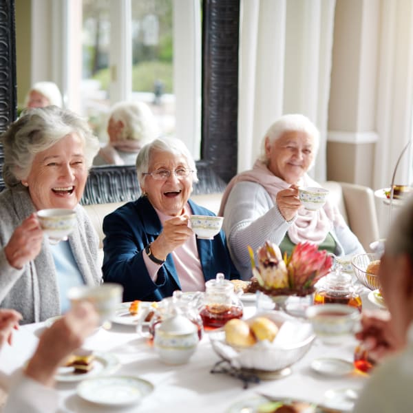 Residents playing games at Courtyard at Coeur d'Alene in Coeur d'Alene, Idaho.