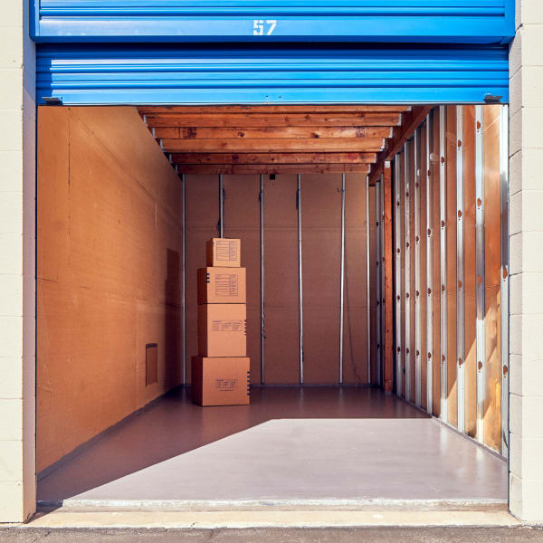 Boxes stacked inside a storage unit at Stor'em Self Storage in San Marcos, California