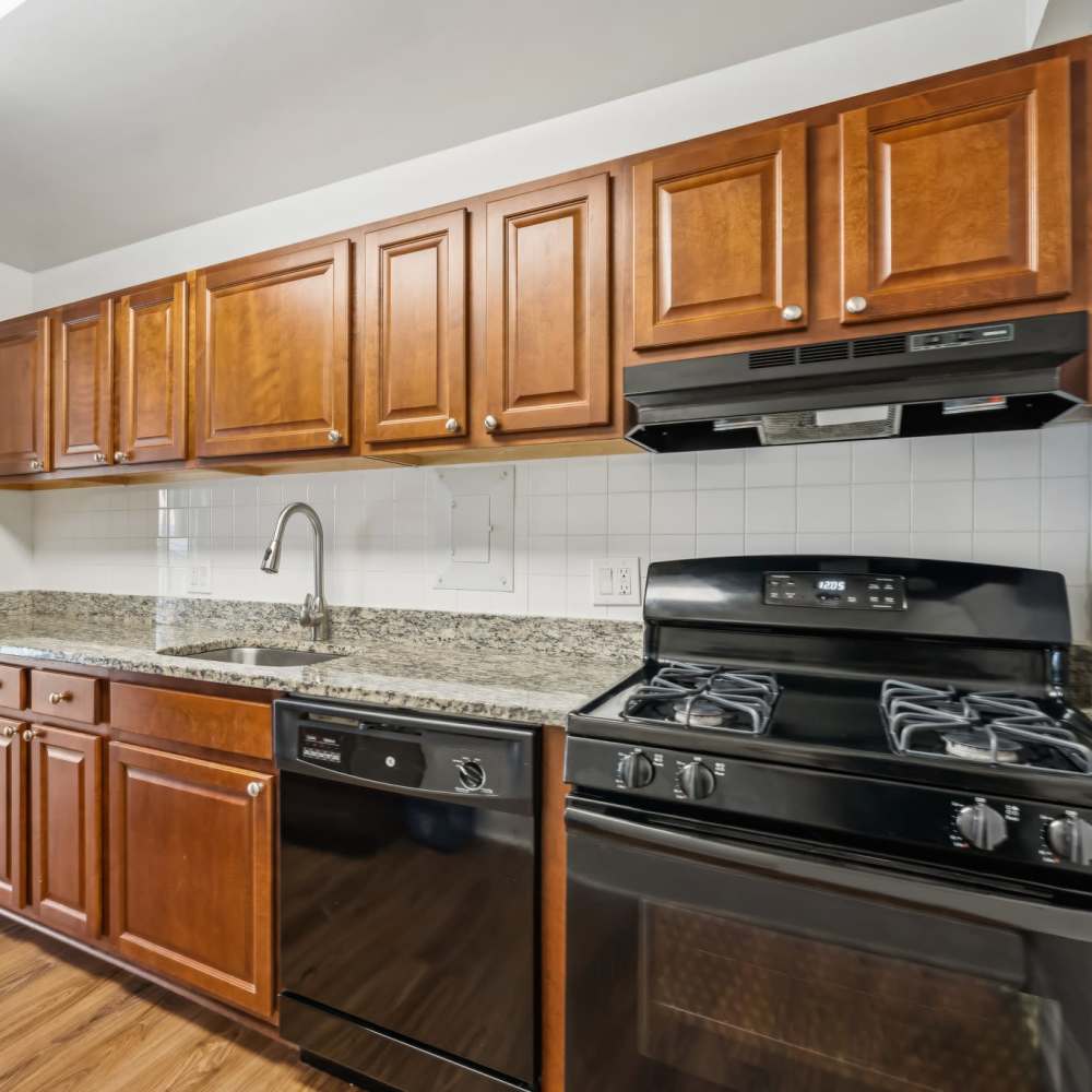 Modern kitchen with wooden cabinets at Georgia West in Silver Spring, Maryland