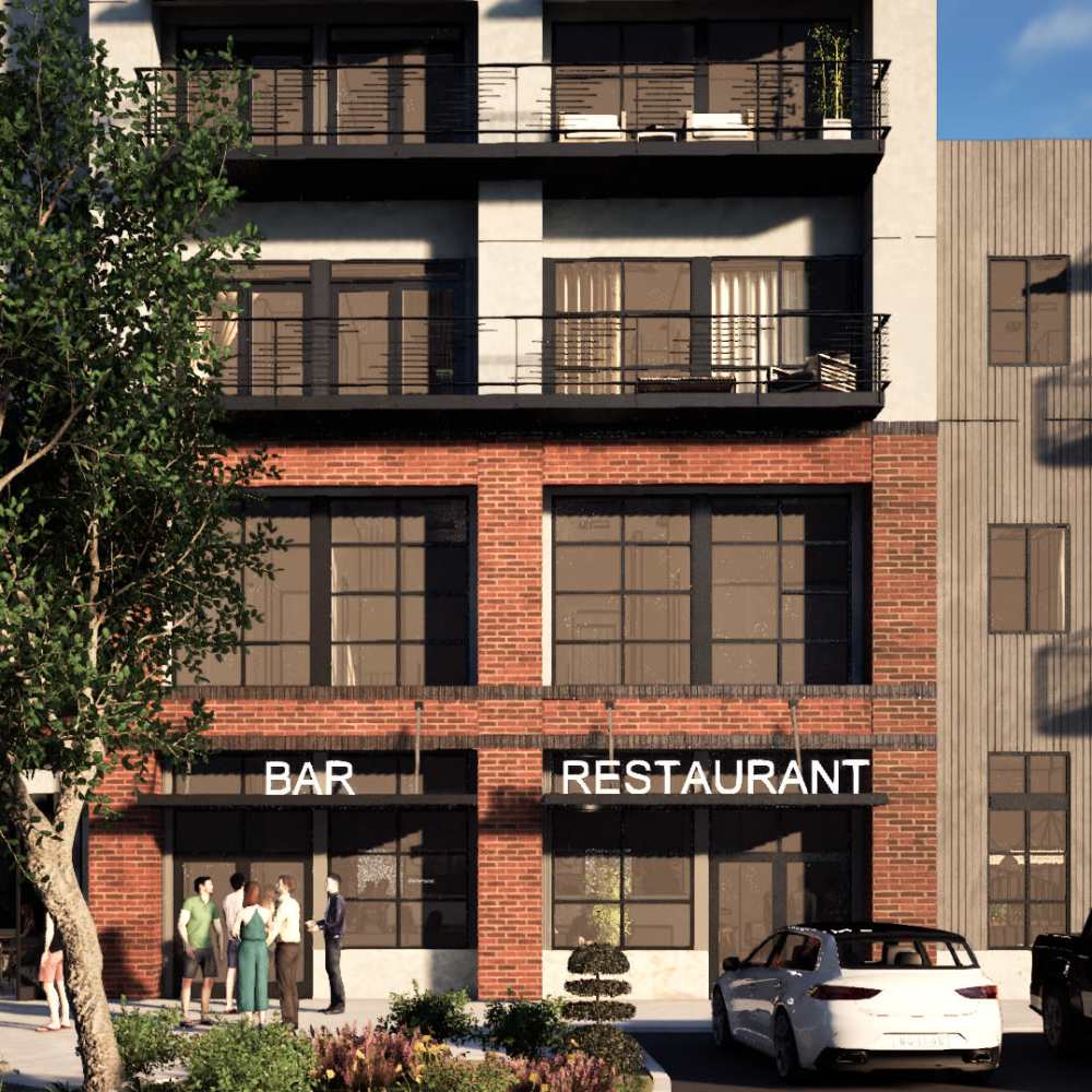 Community exterior view with bar and restaurant at Tower Broadway in Sacramento, California