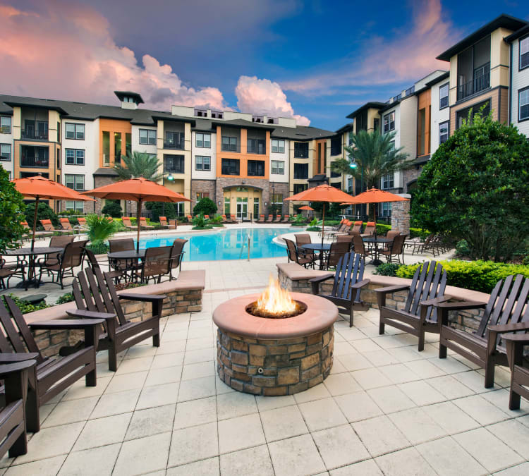 Seating near the fire pit at The Courtney at Universal Boulevard in Orlando, Florida