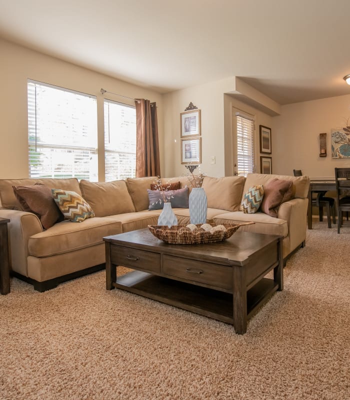 Carpeted living room at Park at Tuscany in Oklahoma City, Oklahoma