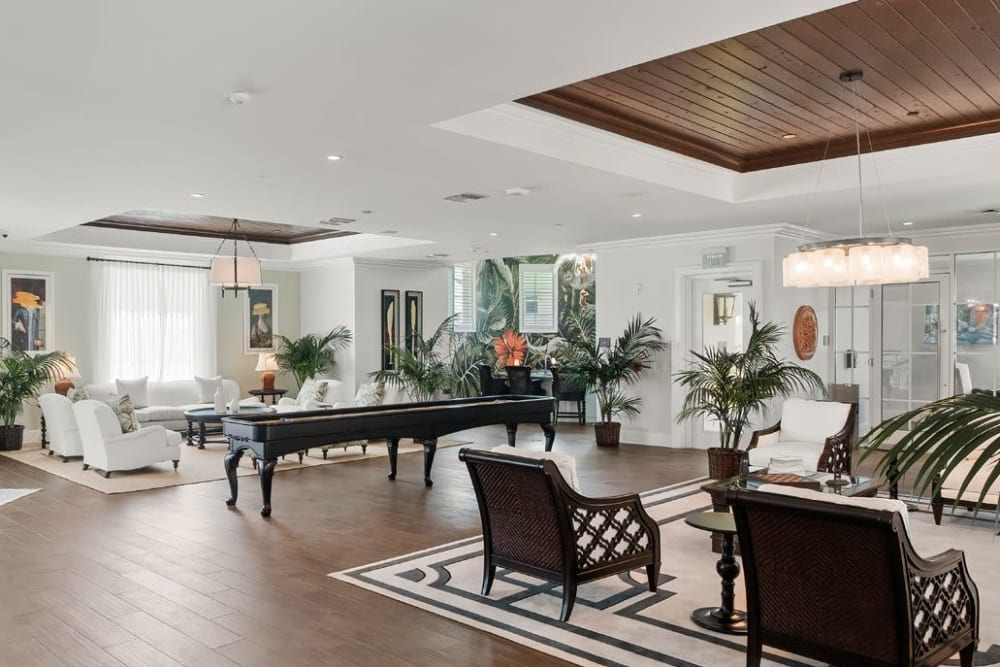 Game room in the spacious and inviting resident clubhouse at Oceanside Lantana in Lantana, Florida