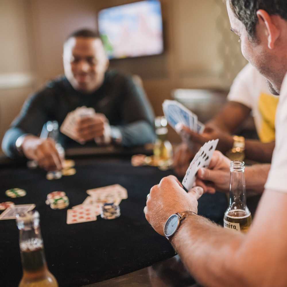 Residents playing cards on game night at Springfield Apartments in Murfreesboro, Tennessee