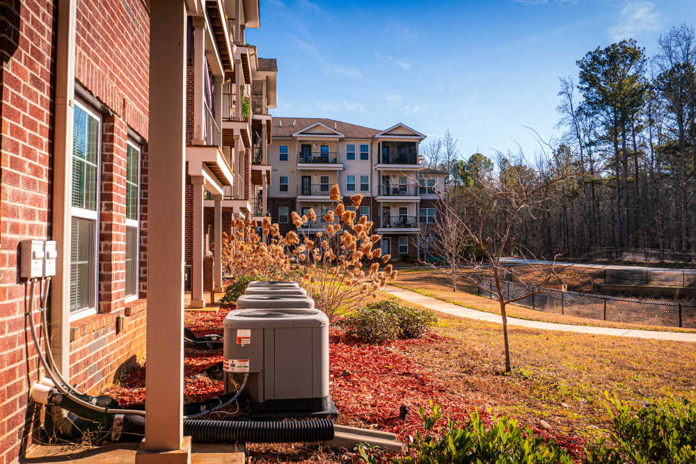Beautiful view of apartments from exterior at Redland Creek in Lawrenceville, Georgia