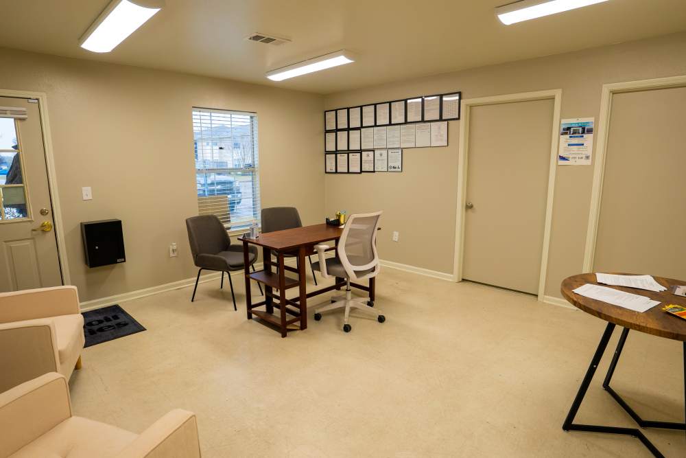Leasing office with large window at Liberty Village in Monroe, Louisiana