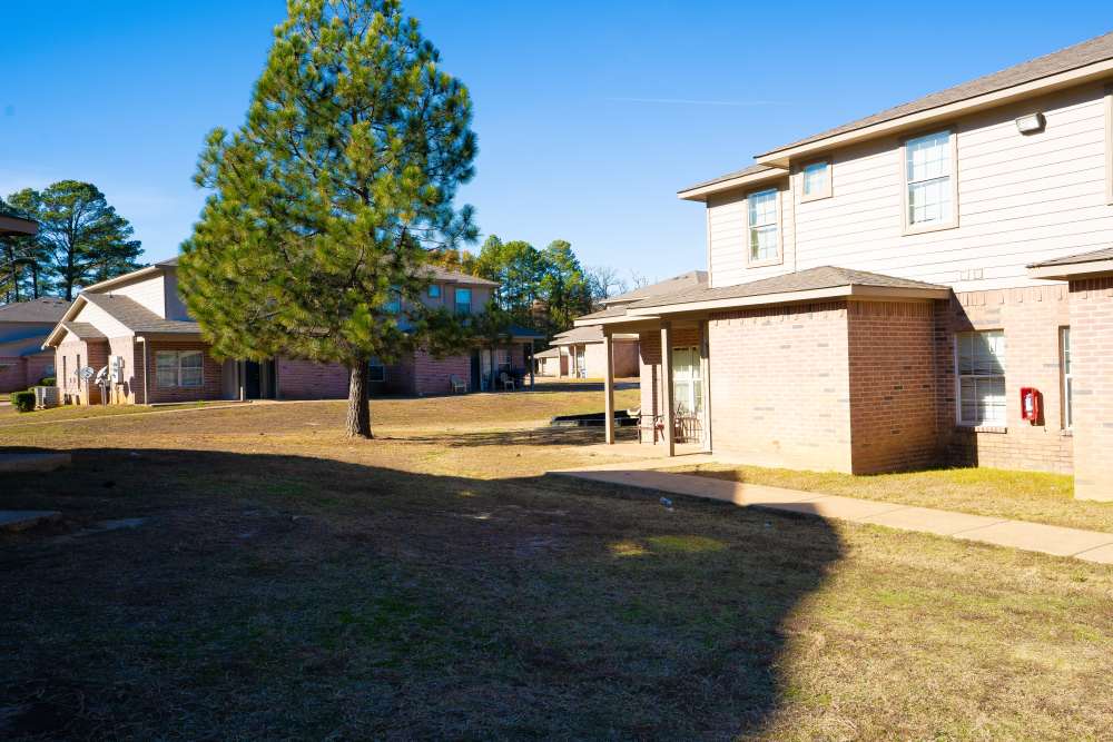 Exterior view of townhomes at Millpoint Townhomes in Henderson, Texas
