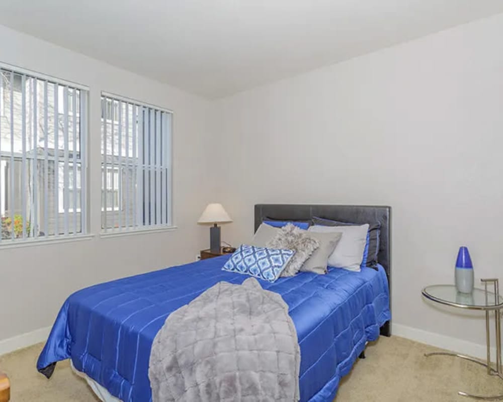 Bedroom with large window at Seville at Mace Ranch in Davis, California