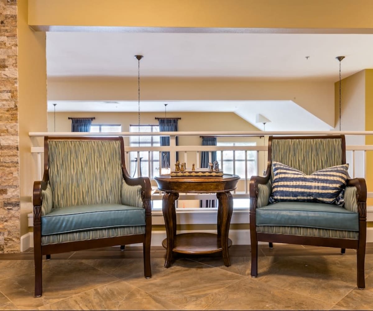 Seating area with a chess board at Pacifica Senior Living Klamath Falls in Klamath Falls, Oregon