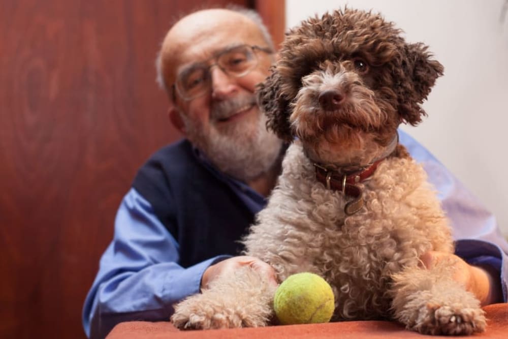 A  resident with his dog at Lassen House Senior Living in Red Bluff, California. 