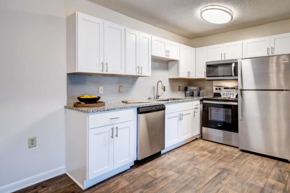 Model kitchen and dining area at Congress Apartment Homes in Allentown, Pennsylvania