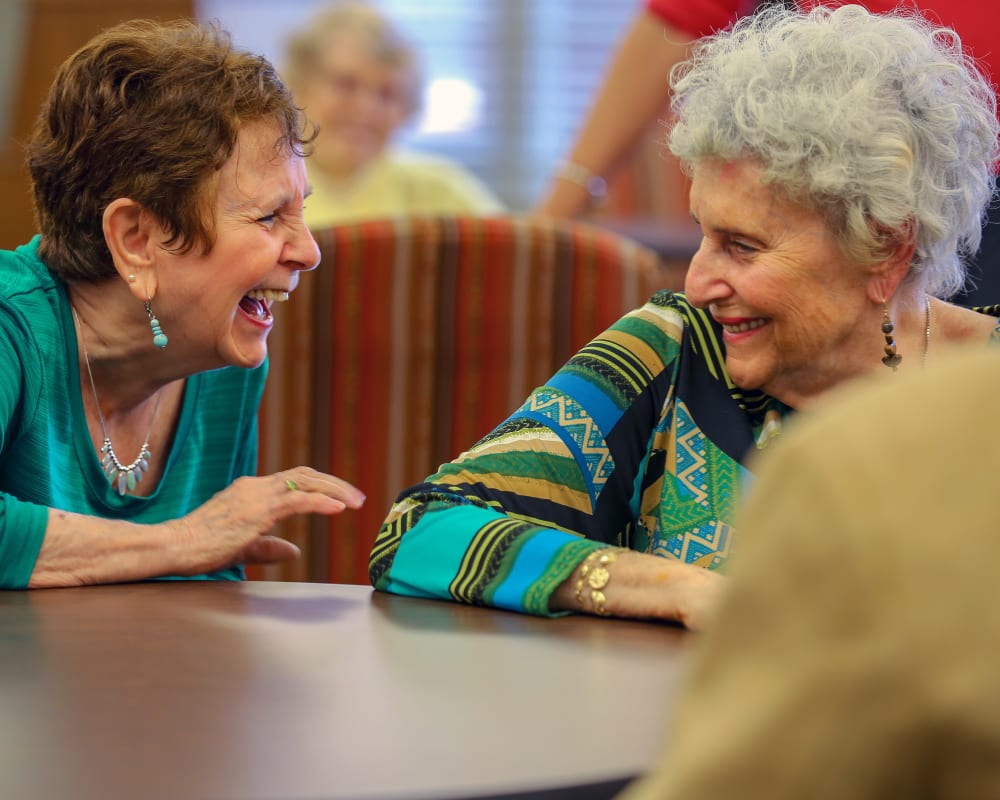 Residents laughing together at Harmony at Avon in Avon, Indiana