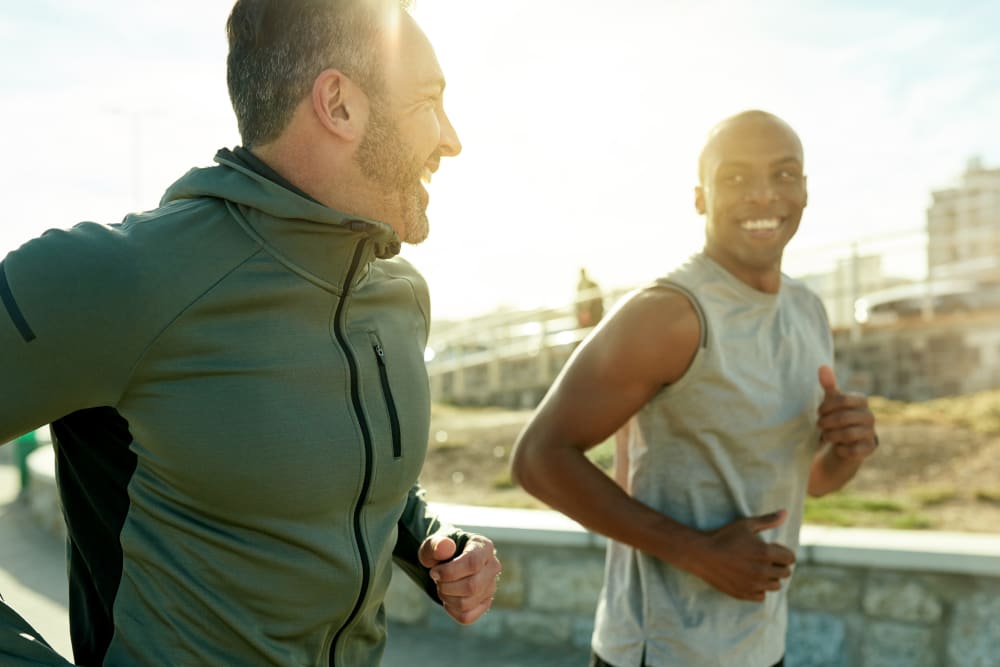 Two men on a jog near Westridge Apartments in Aurora, Colorado