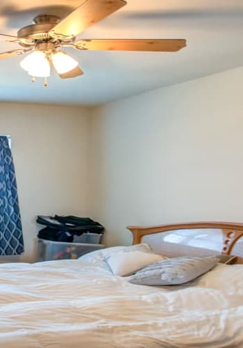 Bedroom at Ocean Harbor Apartments in Belmar, New Jersey