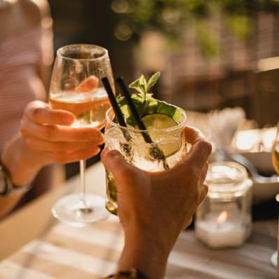 Residents enjoying drinks on the patio of an elegant local restaurant near Steelyard in Oklahoma City, Oklahoma