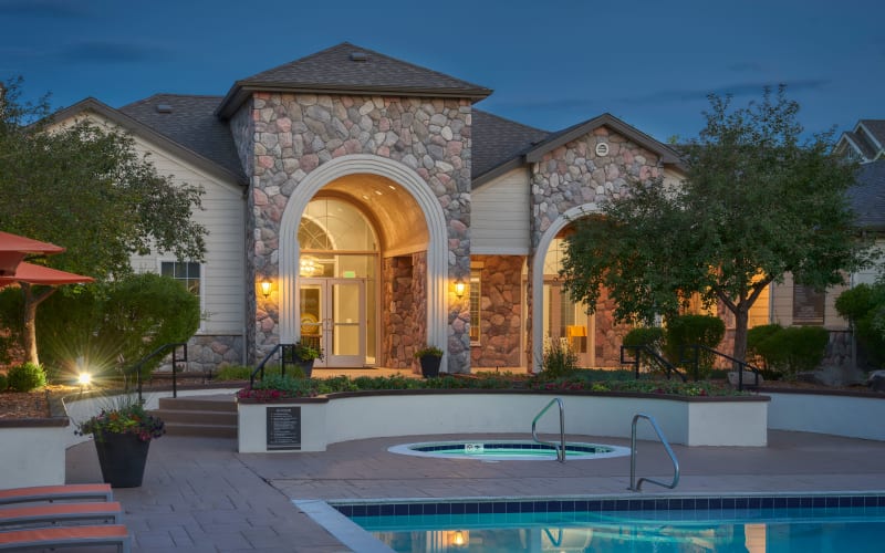 Clubhouse exit to the swimming pool at dusk at Legend Oaks Apartments in Aurora, Colorado