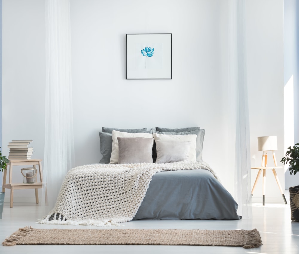 Simply decorated bedroom in model home at Haven New Providence in New Providence, New Jersey
