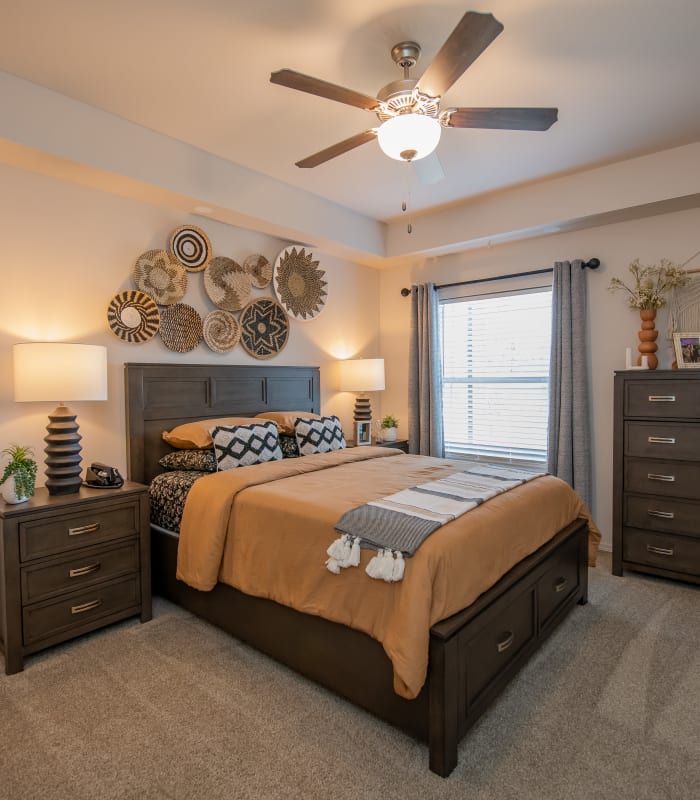 Chic bedroom at 24Hundred Apartments in Oklahoma City, Oklahoma