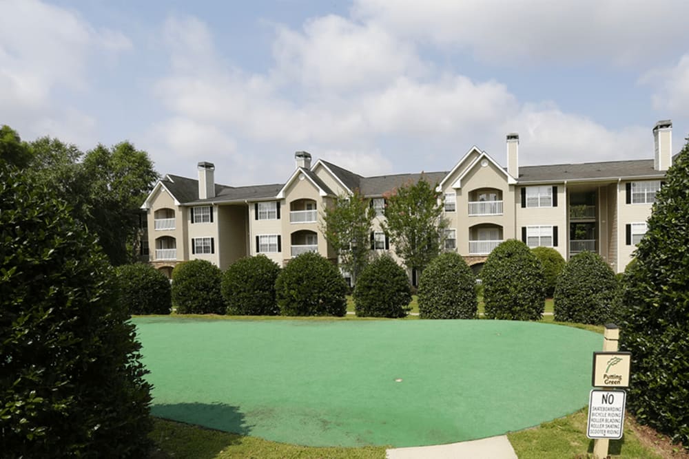 Community surrounded by greenery at Arbors at Fairview Apartments in Simpsonville, South Carolina