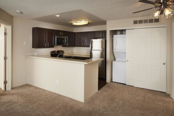 Kitchen View with Washer and Dryer at Bluesky Landing Apartments in Lakewood, CO